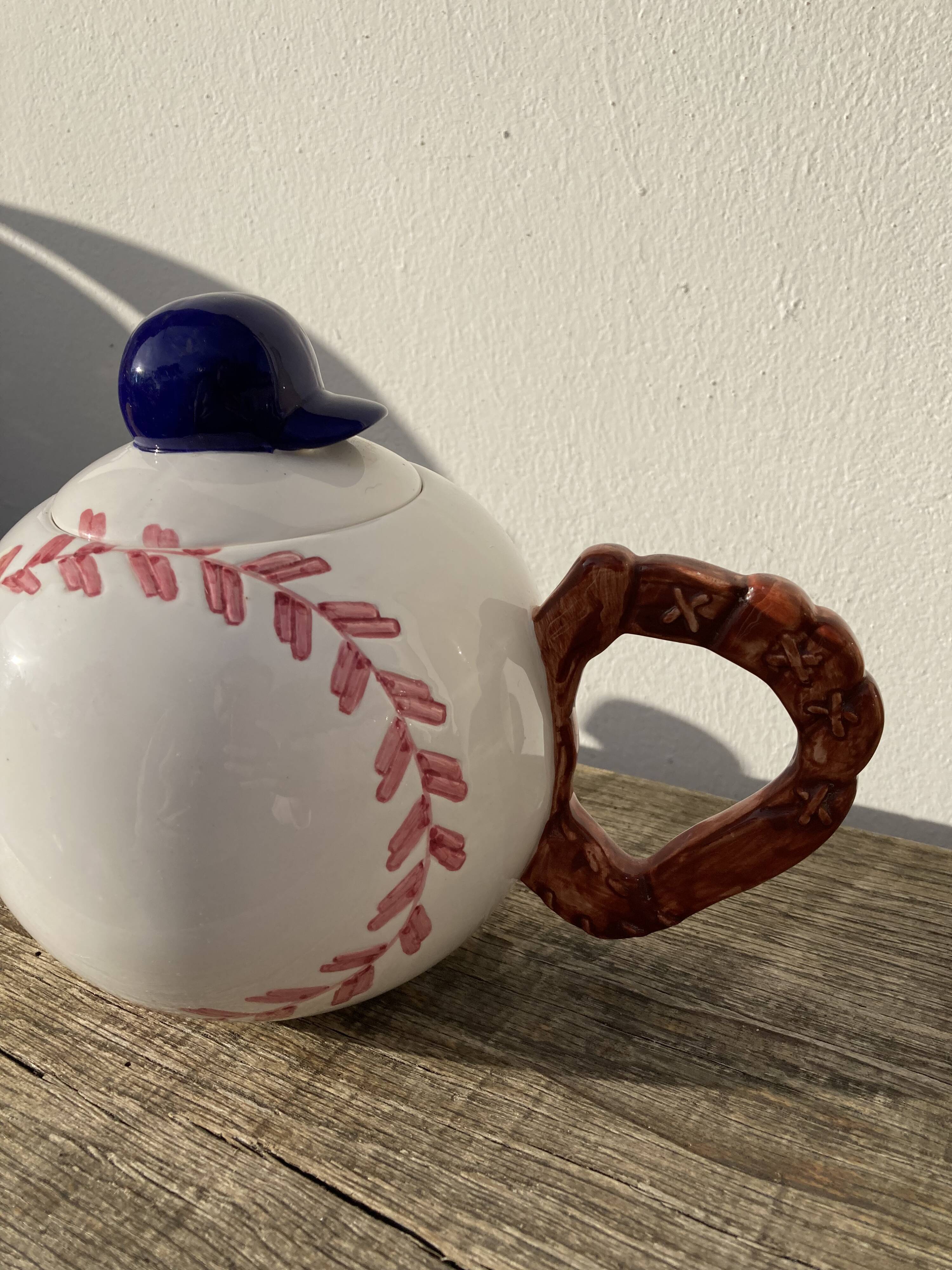 Teapot in white ceramic baseball