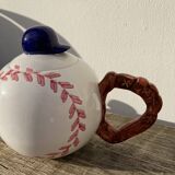 Teapot in white ceramic baseball