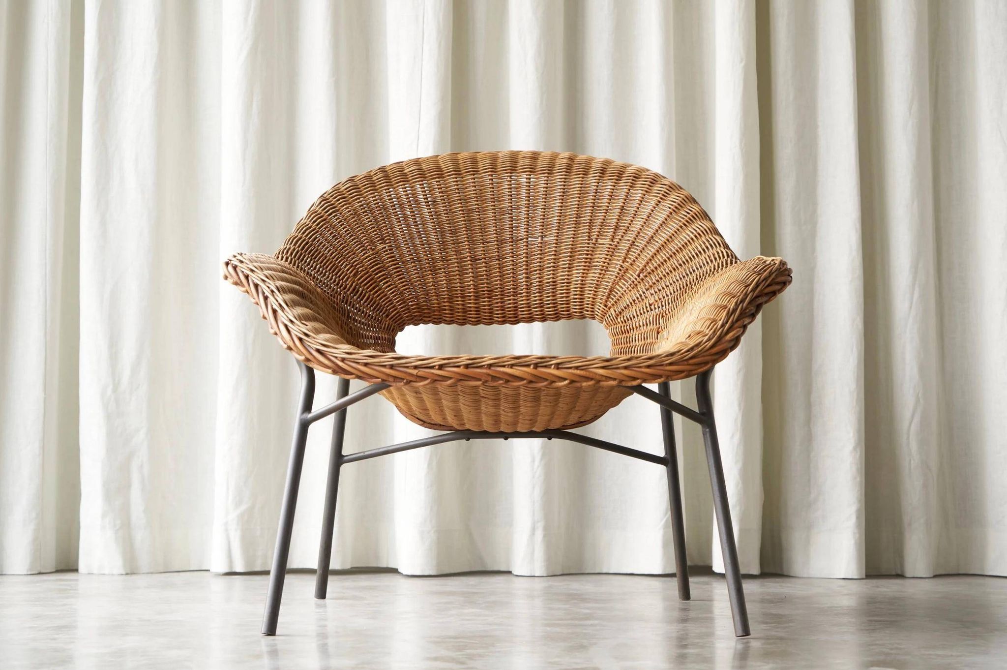 Sculptural lounge chair in rattan and metal, 1960s
