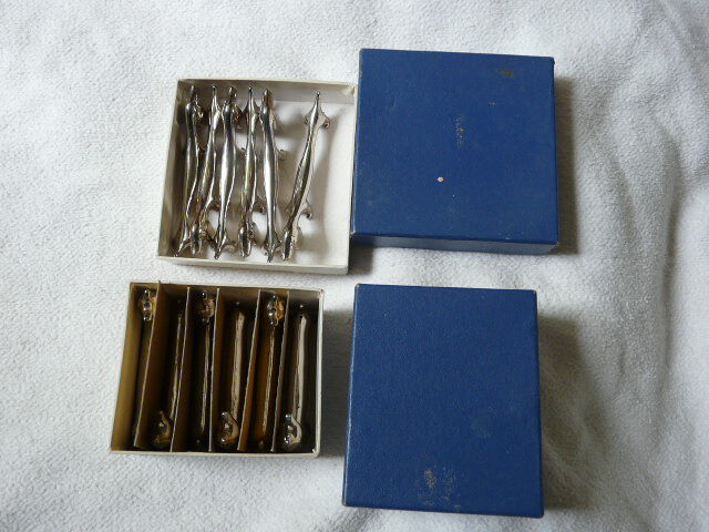 12 silver metal knife holders 6 dogs and 6 cats