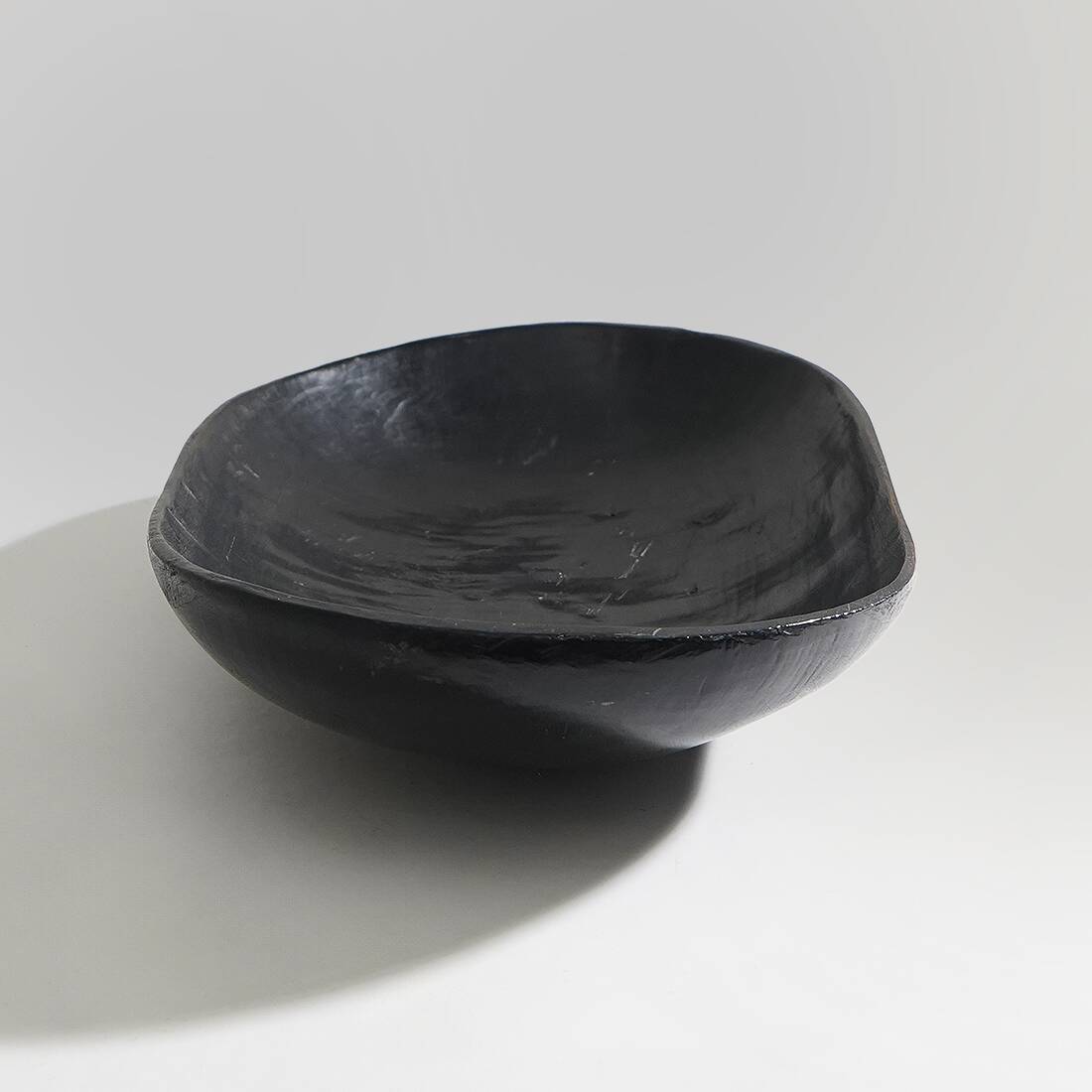 Organic shaped black wooden bowl, 1960s