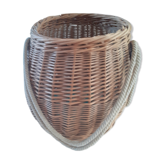 Old rattan basket. round with 2 rope handles.