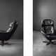 Vintage black leather swivel chair in mid-century modern Scandinavian style.