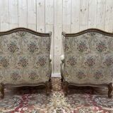 Paire de fauteuils bergères de style Louis XVa oreilles