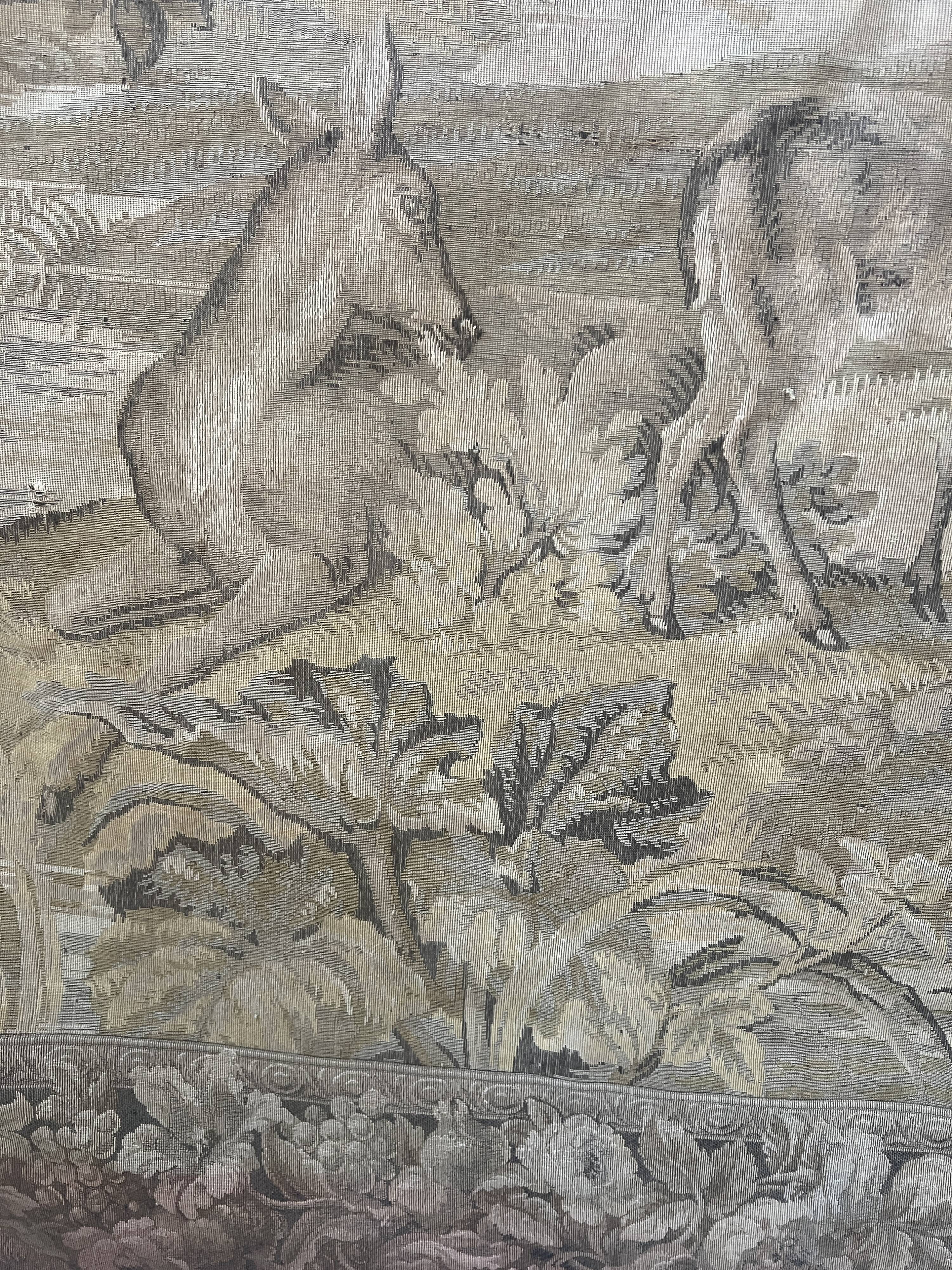 Renaissance-style tapestry with animal motifs, 20th century.