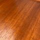 Mid-century teak and walnut side table, 1960s.