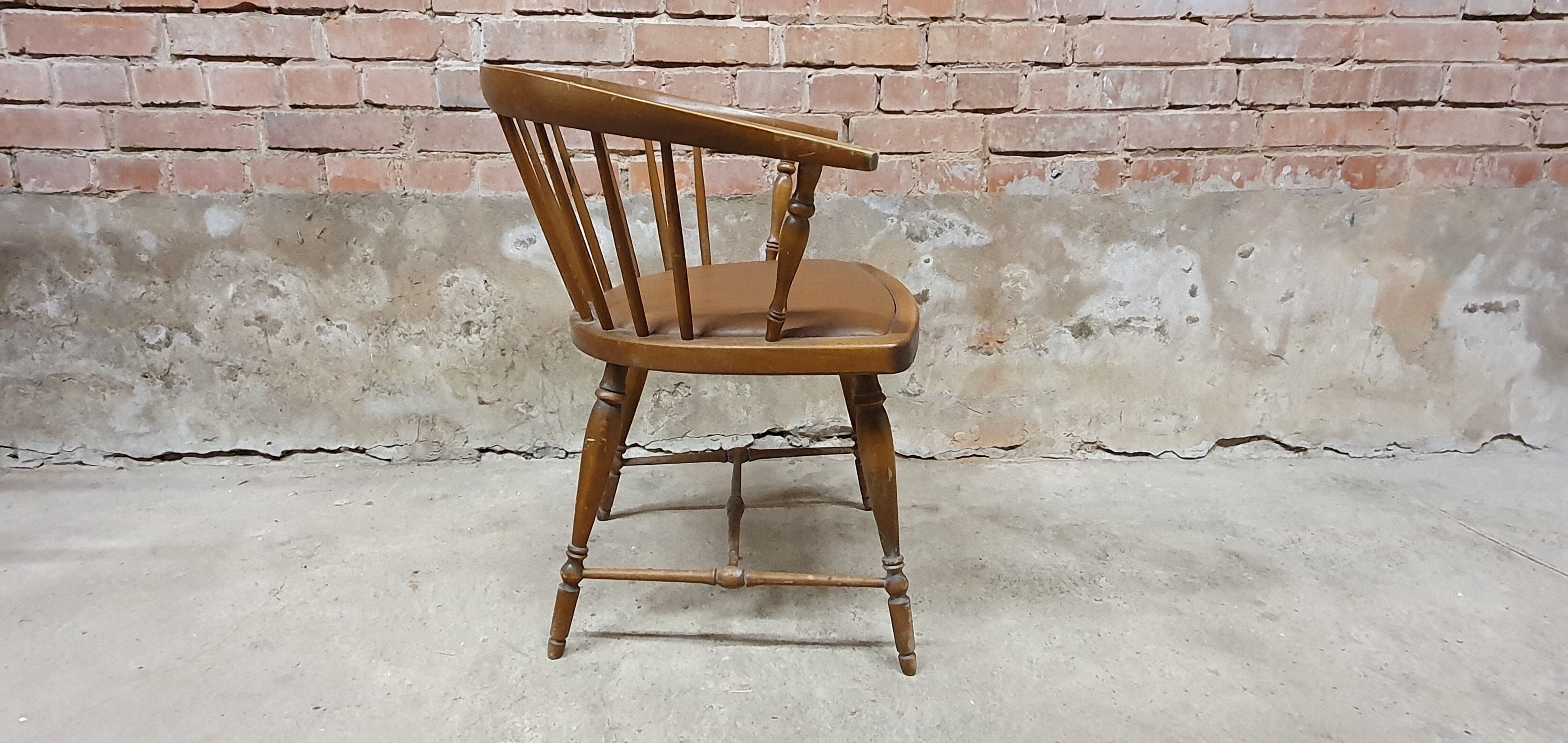 Vintage office armchair with Scandinavian style bar