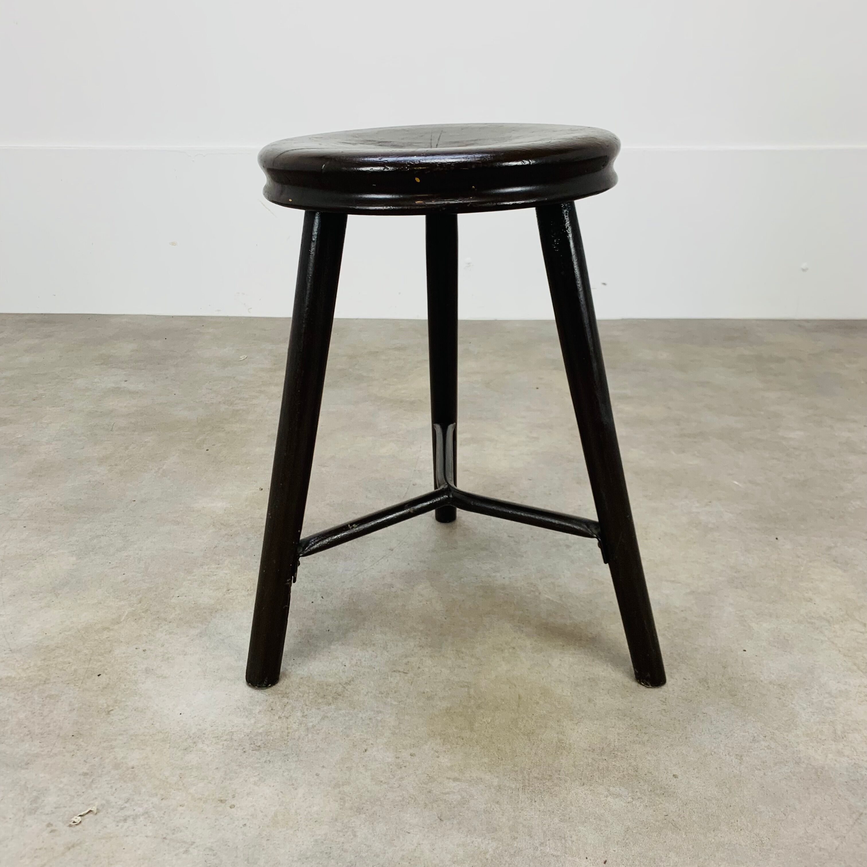 Industrial metal and wood tripod stool