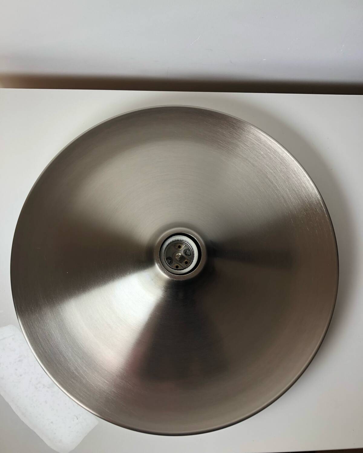 Modernist disc wall sconce