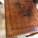 Pair of studded nesting tables and 1930