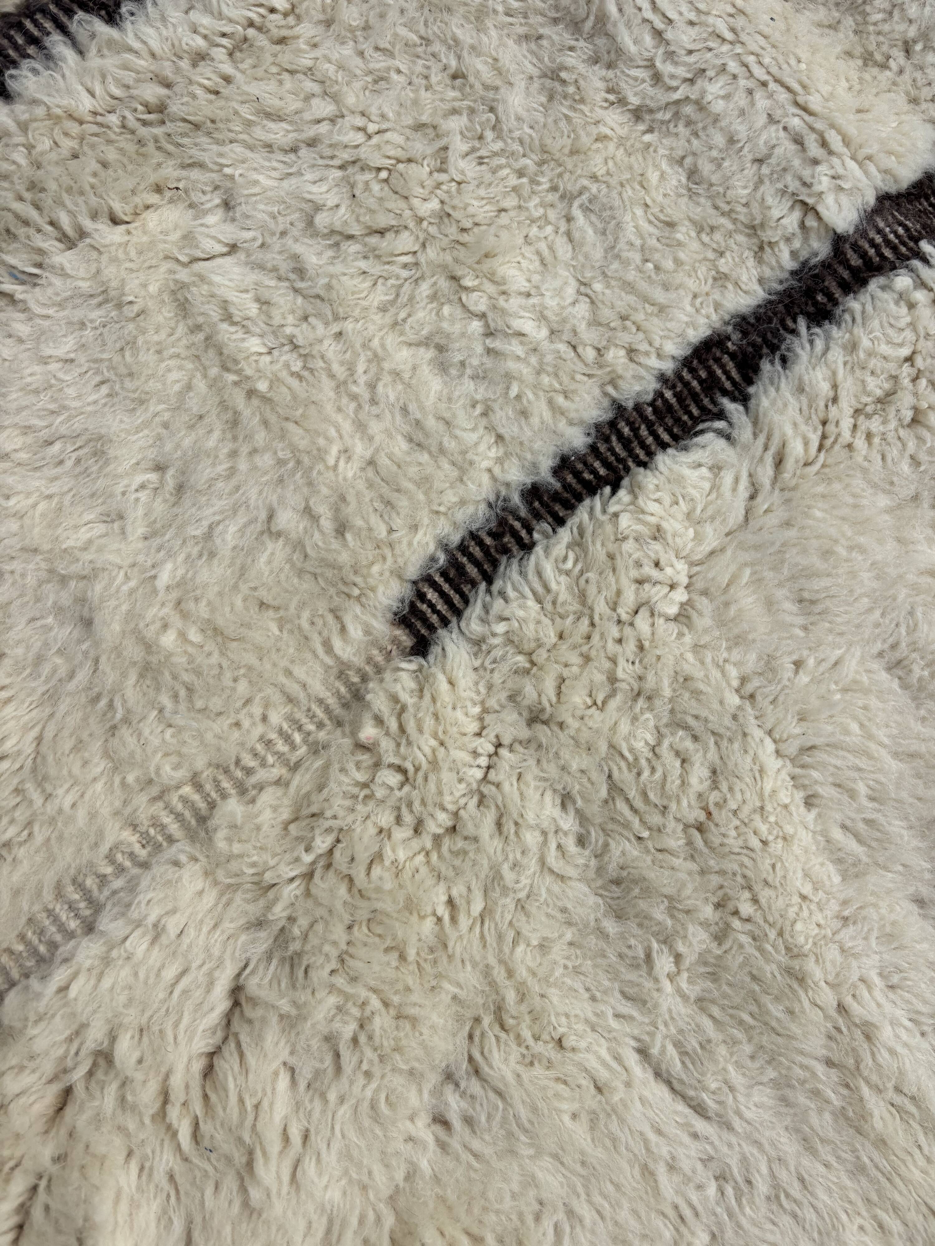 Large Berber M'rirt rug in cream and black wool, Moroccan rug.