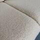 Complete living room with rattan sofa and white bouclette, brass finish, 80's design