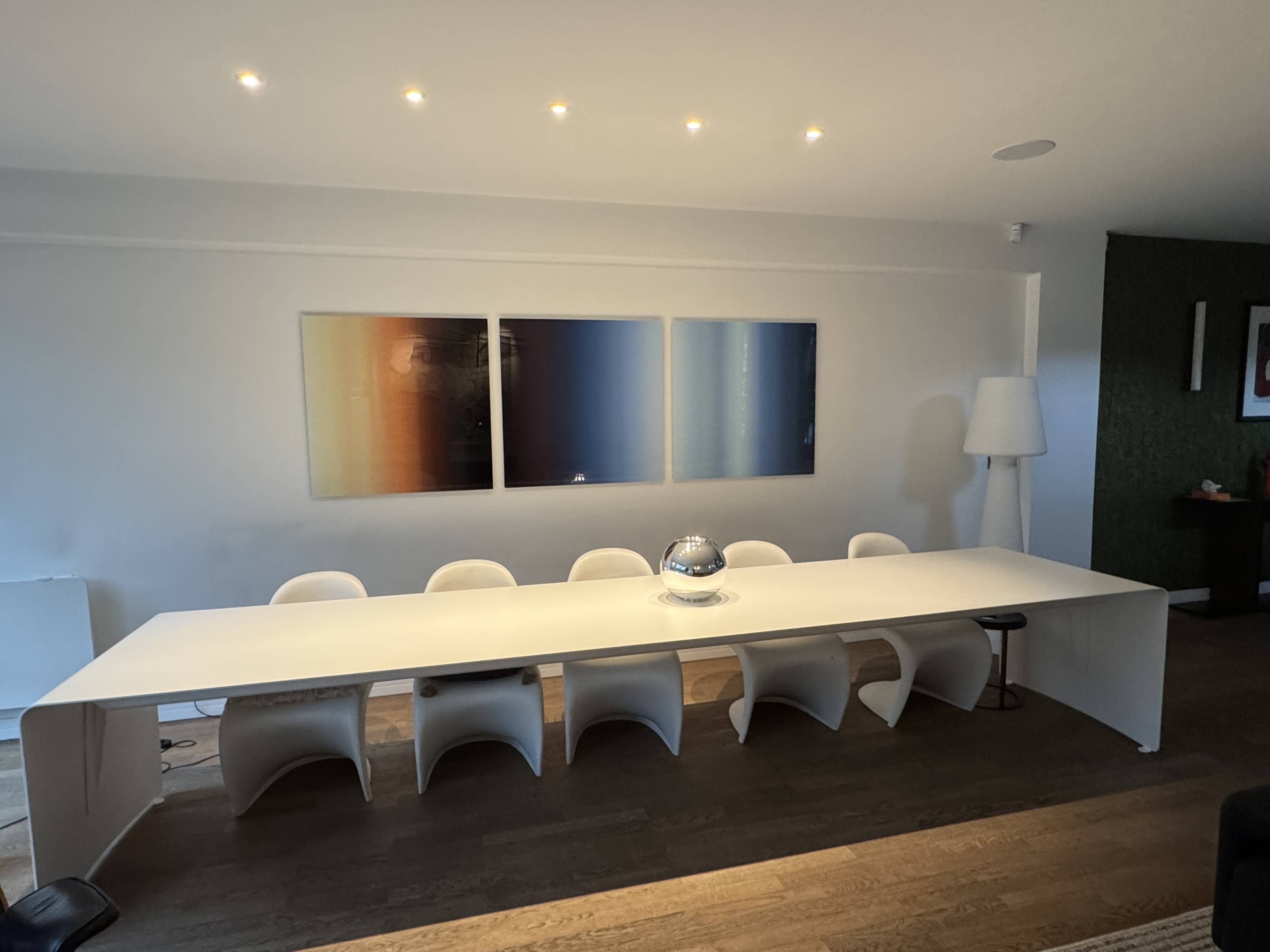 Large curved aluminium tabletop.