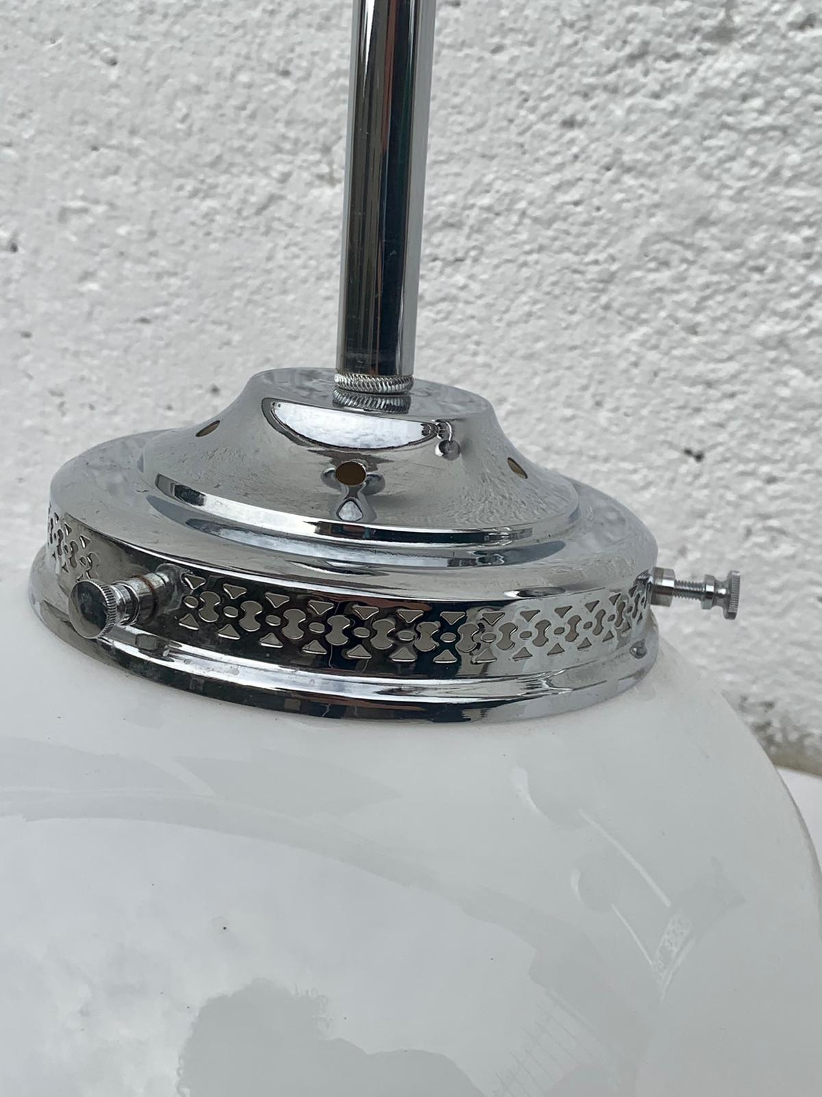 Glass and aluminum globe hanging lamp