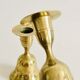 Pair of brass "bell" candle holders