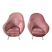 An elegant pair of armchairs with brass legs, Italy from the mid-20th century.