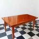 Mid-century vintage coffee table with tapered legs.