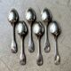 6 large Christofle silver-plated spoons with shell decoration.
