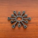 Brutalist Danish candlestick in cast iron from the mid-century by Jens H. Quistgaard for Paro, 1960s.