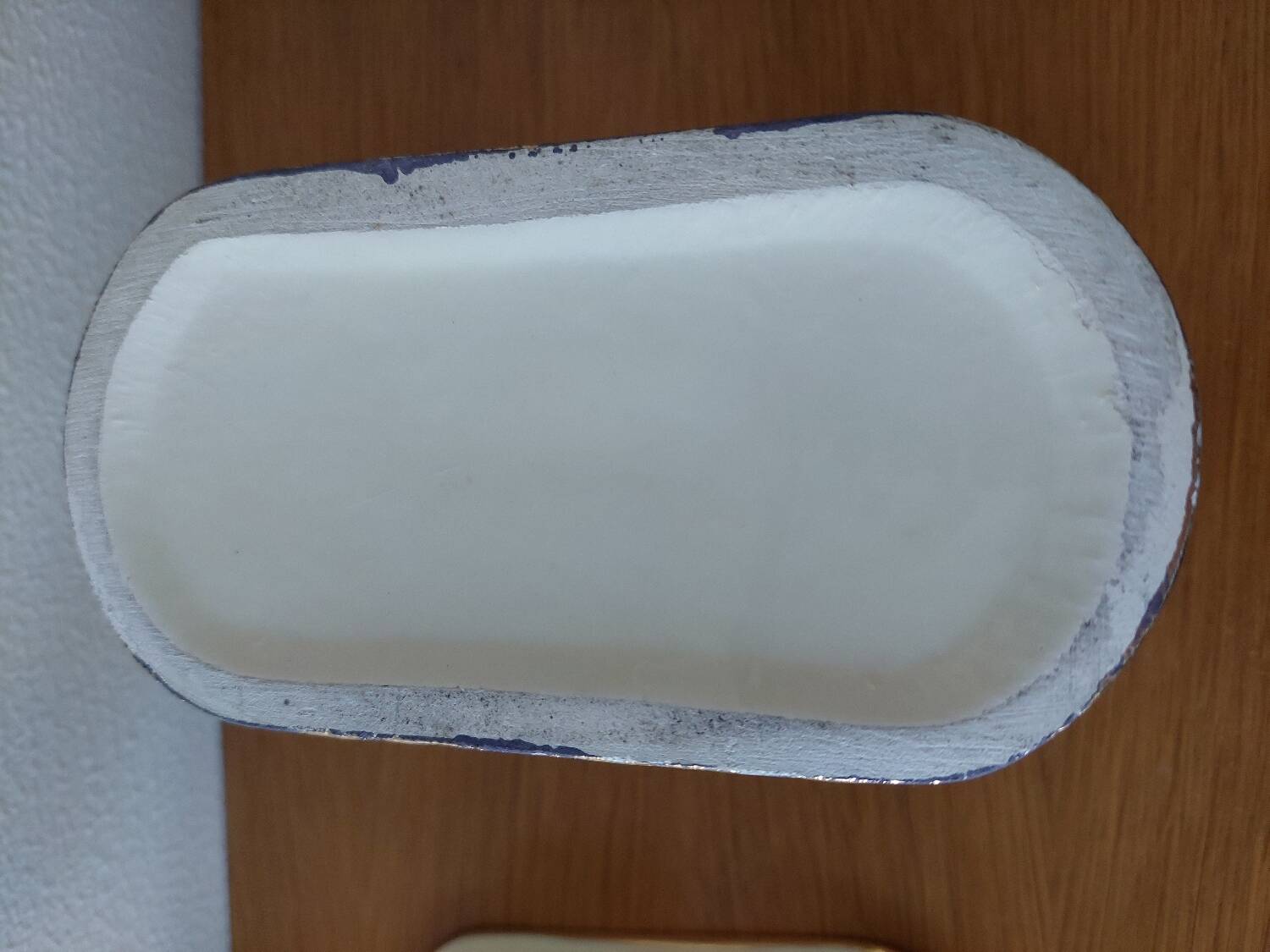 Pair of cream ceramic candlesticks with gold trim circa 1930-1950