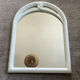 Vintage Art Deco style mirror in stained white wood.