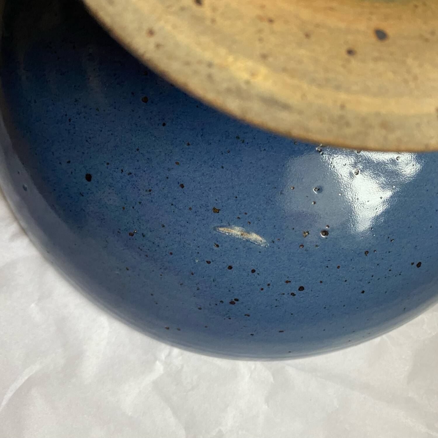 Signed blue stoneware fruit bowl