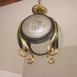 Suspension of years 50-60 in glass and metal