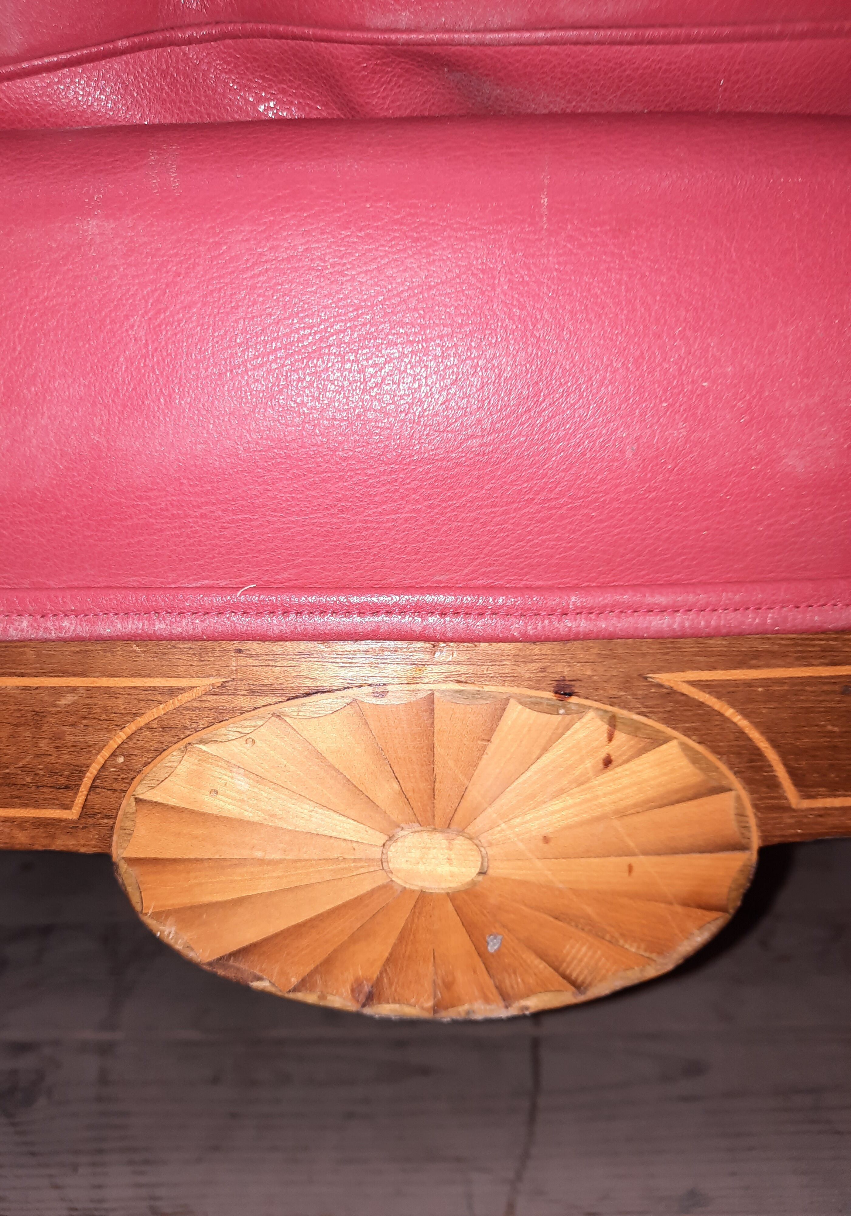 Pair of red leather armchairs