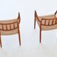 Niels Otto Moller model 66 armchairs teak and paper cord Denmark 1974