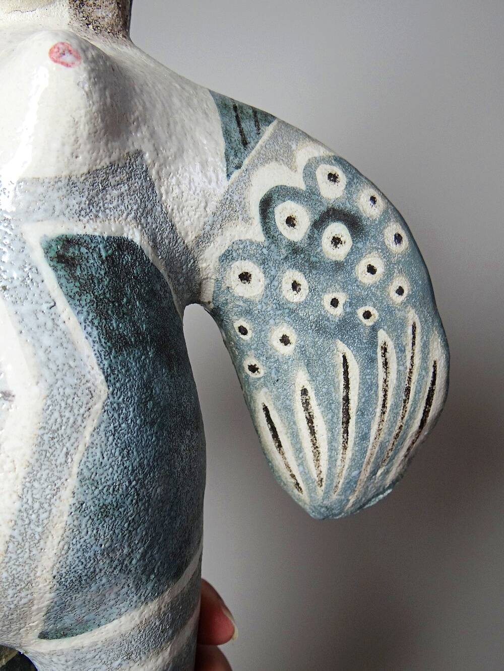 Vintage stylised mermaid ceramic wall sculpture from an art studio.