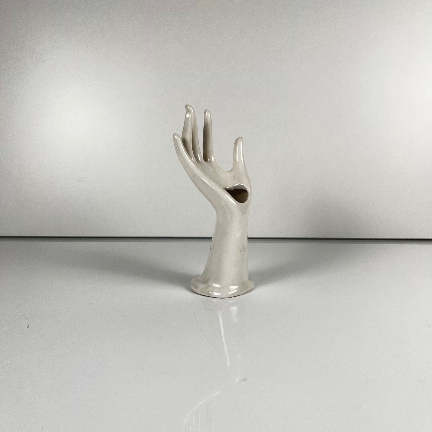 White porcelain single-stem vase