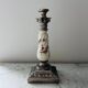 Silver-plated metal and porcelain candlestick