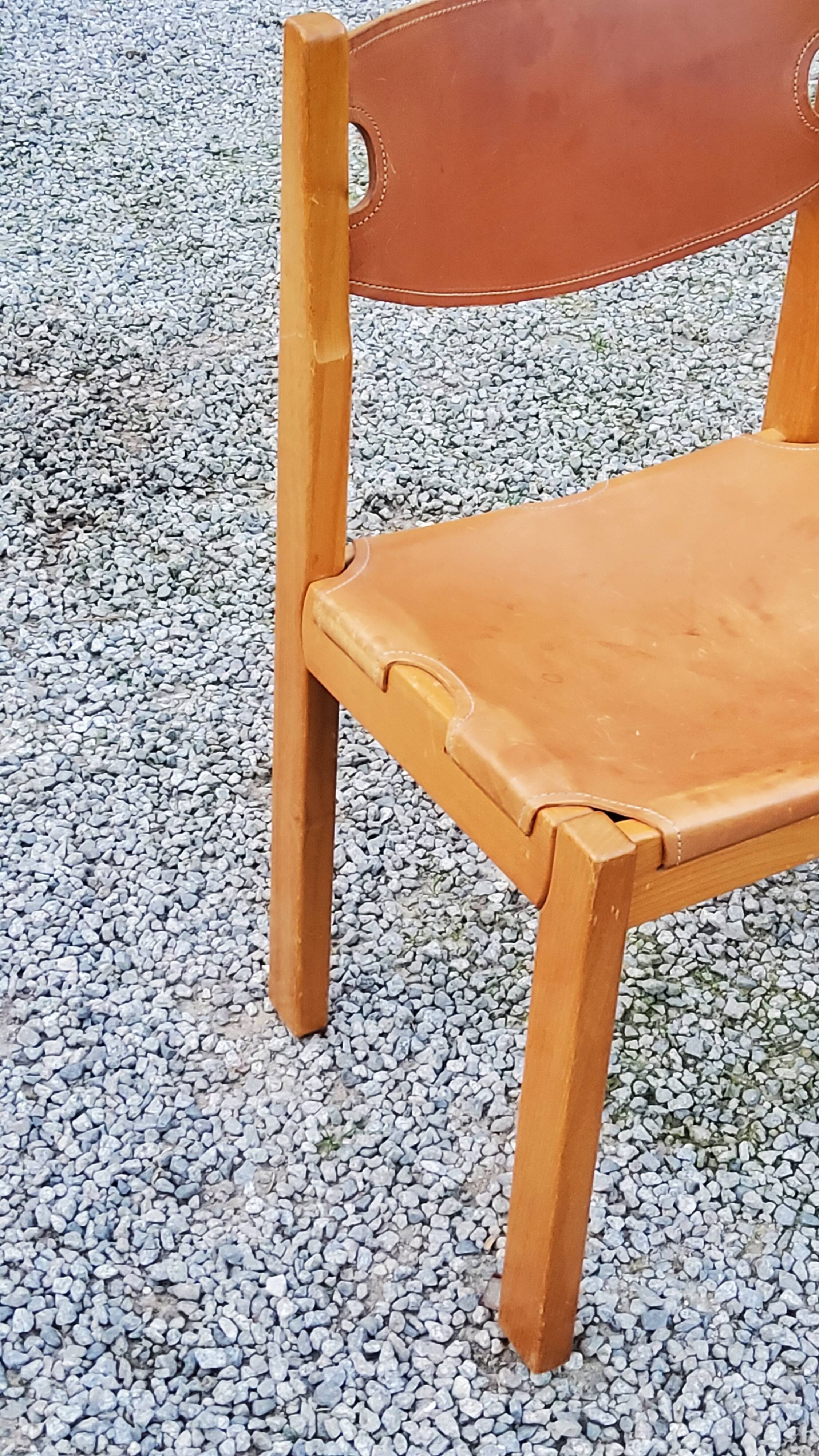 Pair of brutalist chairs in elm and stretched leather with saddle stitching Self publisher