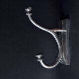 Pair of vintage cast aluminum coat hooks