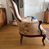 Violin-backed cabriolet armchair, in the Louis XV style.
