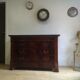 Commode Louis Philippe bois et marbre noir, 4 tiroirs