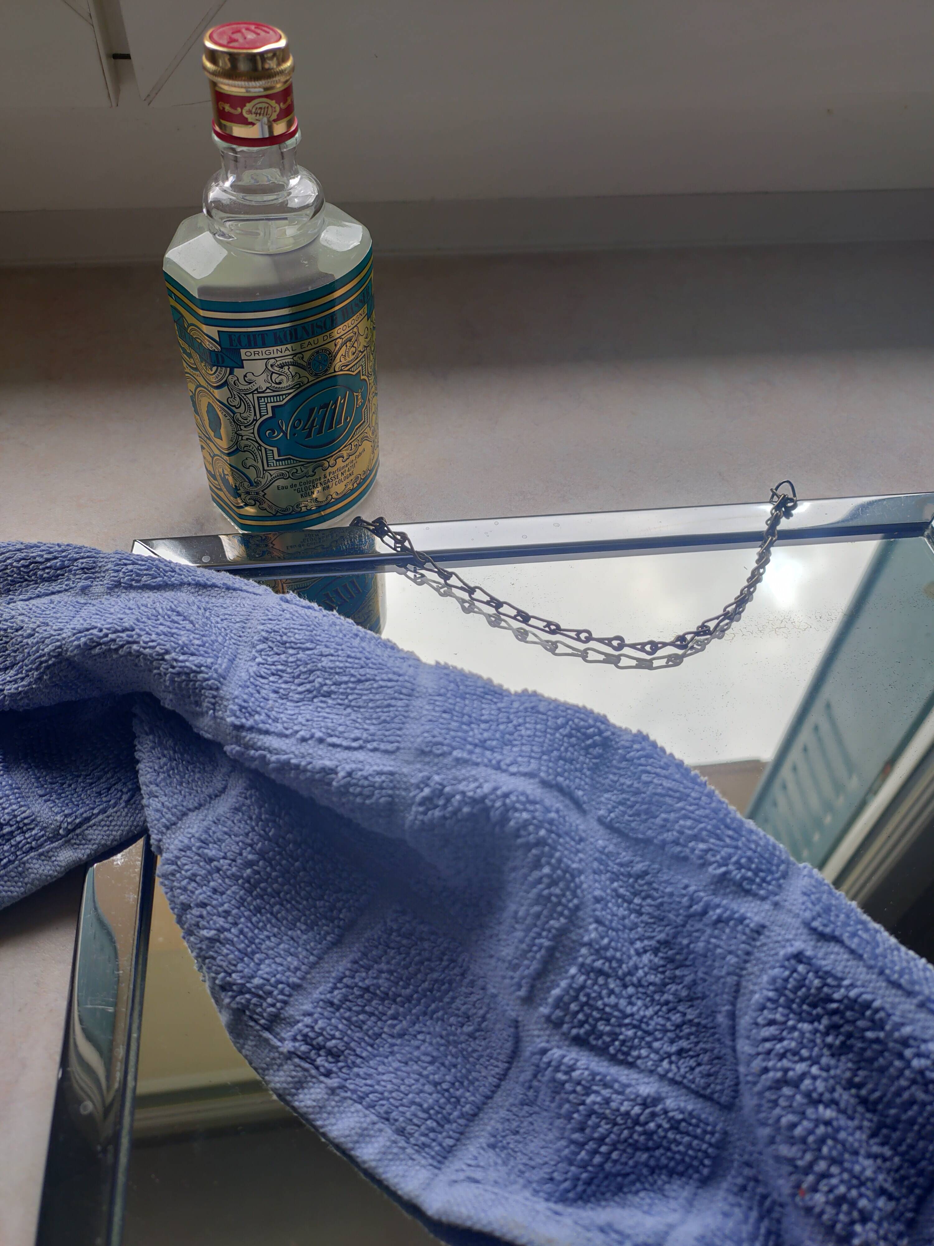 Barber mirror with chain.