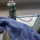 Barber mirror with chain.