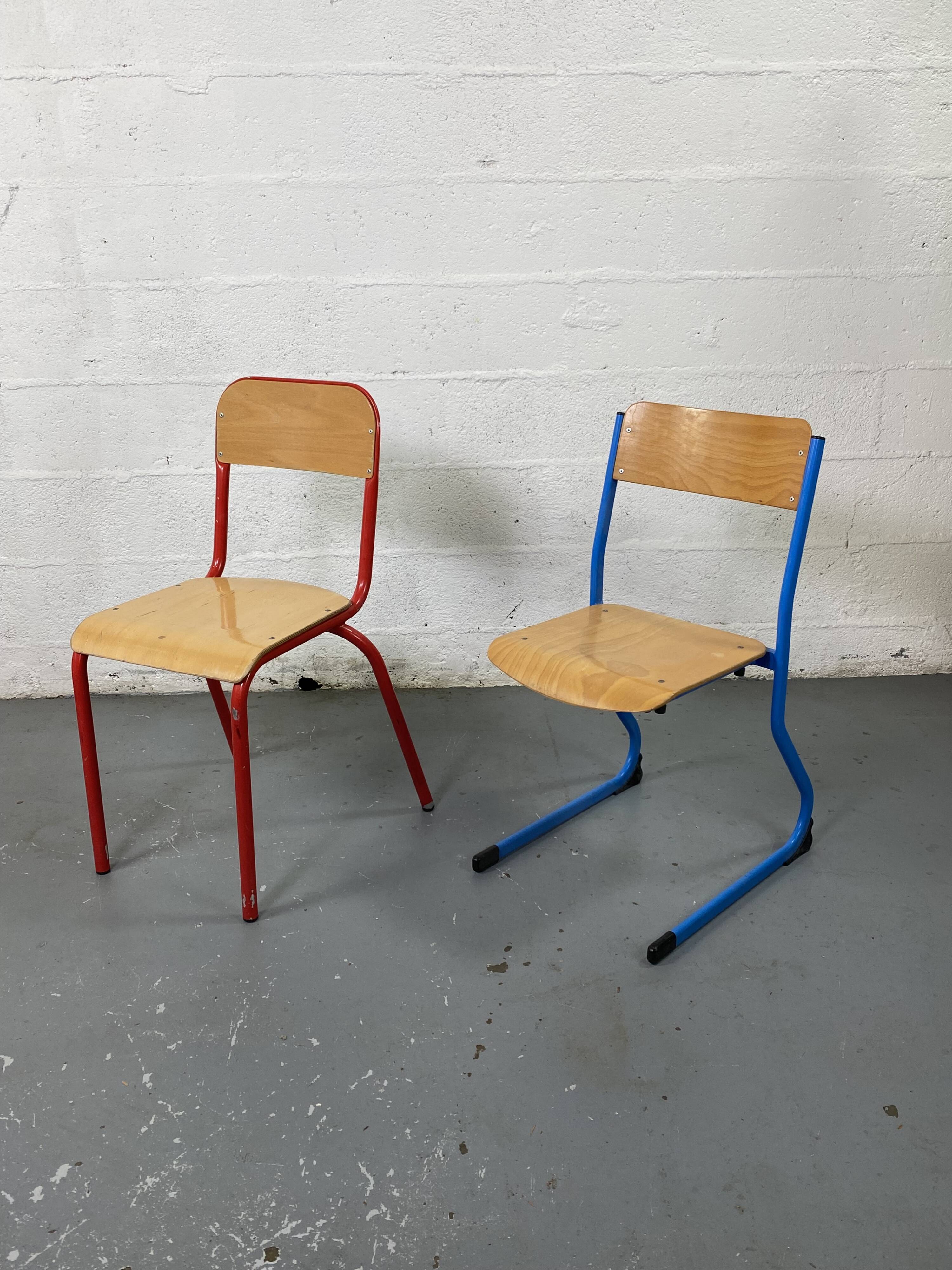 Set of 2 mismatched industrial school chairs