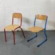 Set of 2 mismatched industrial school chairs