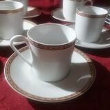 Cups and saucers in fine porcelain with gilded edging