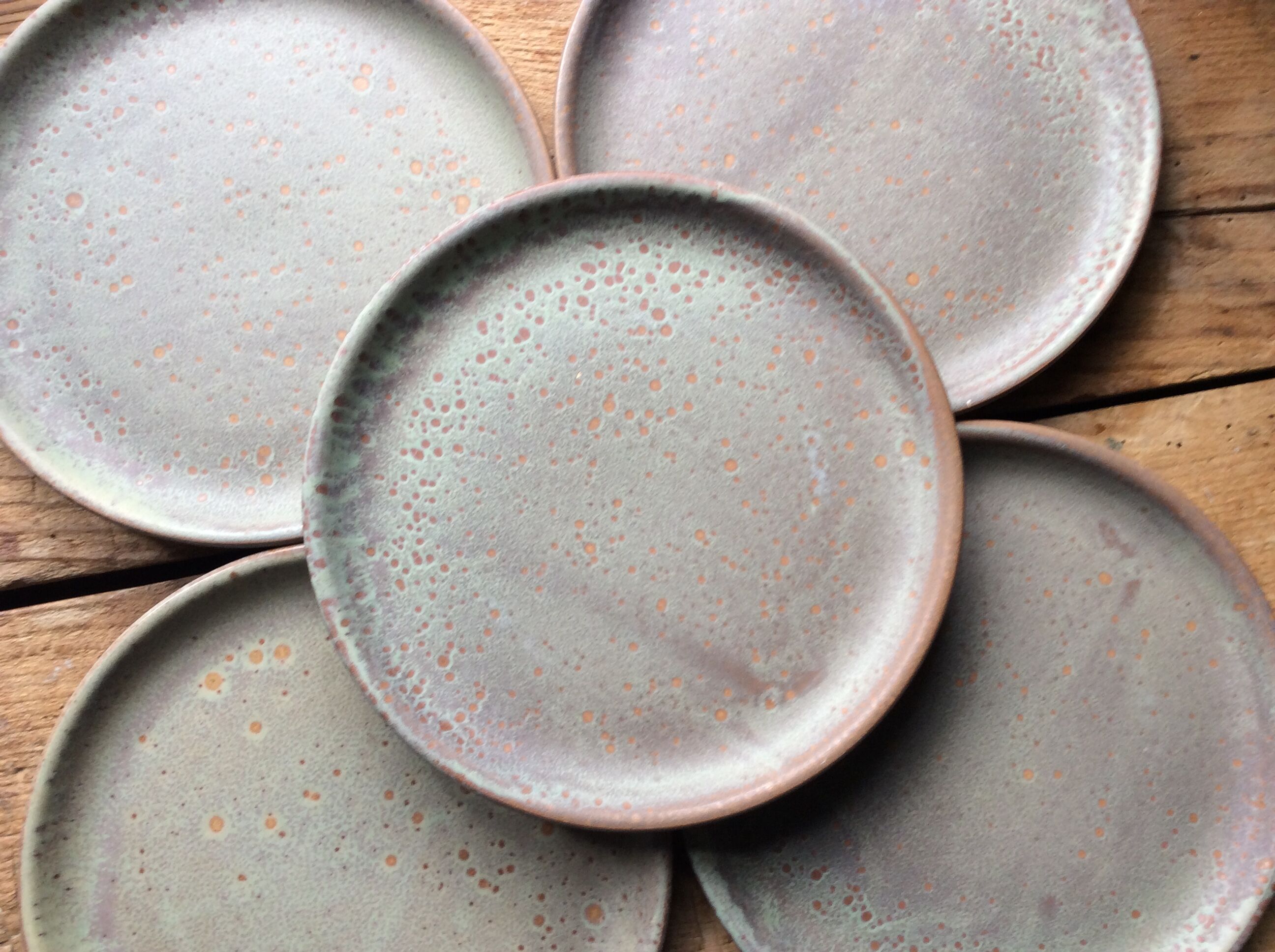 Set of 12 large and 11 small sandstone plates