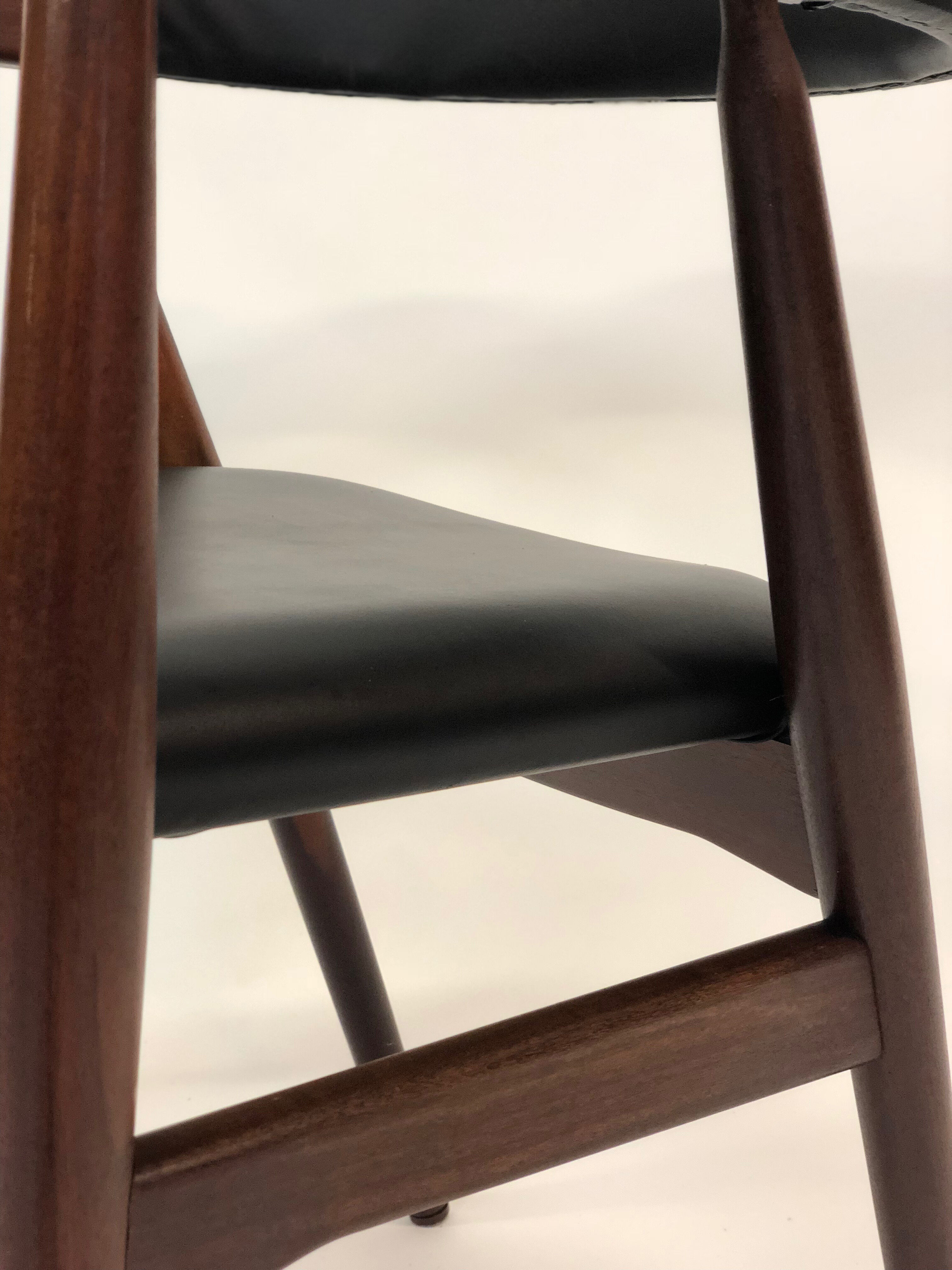 Vintage armchair from the 60s in teak