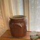 Ancient ceramic salt cellar and its lid.