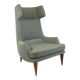Monumental grey wingback armchair from mid-century Austria by Oswald Haerdtl.