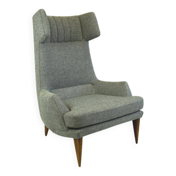 Monumental grey wingback armchair from mid-century Austria by Oswald Haerdtl.