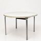 Vintage round extendable dining table, white laminate on chrome legs.