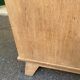 Vintage 1950s oak enfilade buffet with tapered legs.
