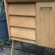 Vintage sideboard with tapered legs, light oak, 1960s.