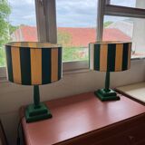 Pair of wooden bedside lamps with striped lampshades